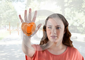 Woman touching digitally generated pulse rate