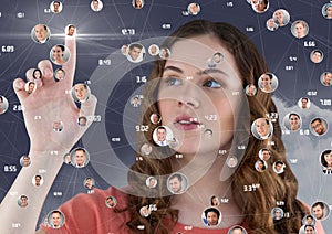 Woman touching digitally generated social networking icons