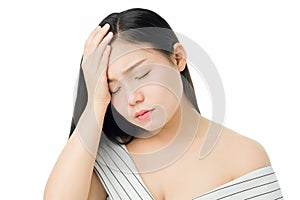 Woman touching head to show her headache. Causes may be caused by stress or migraine. Or because too much work.