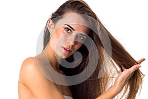 Woman touching her hair