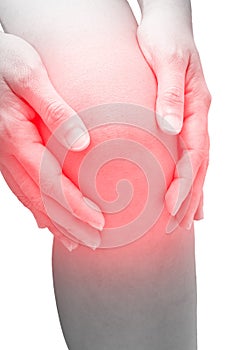 Woman touching her knee at pain point, with red spot on knee,  on white. Joint pain, Arthritis and tendon problems.