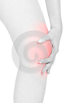 Woman touching her red painful kneecap, clipping path
