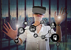 Woman touching interface flare while using virtual reality headset