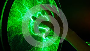 Woman touching plasma panel display