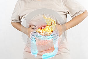 Woman touching stomach painful suffering from stomachache causes of menstruation period, gastric ulcer, appendicitis or