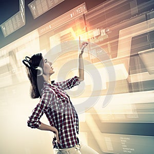 Woman touching virtual screen