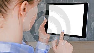 Woman touching white blank display of digital tablet - mockup image