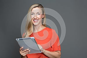 Woman with a touchscreen tablet