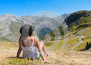 Woman tourist admiring views of the mountains.