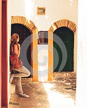 Woman tourist in Cordoba typical street
