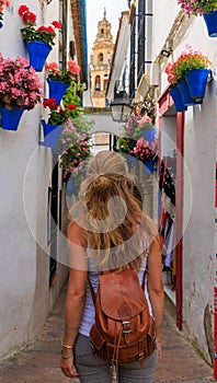 Woman tourist in Cordoba typical street