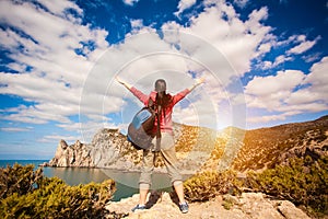 Woman tourist is enjoying landscape photo