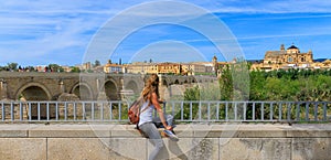 woman tourist enjoying panorama view of Cordoba city landscape