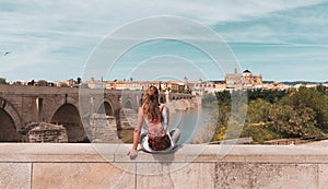 woman tourist enjoying panorama view of Cordoba city landscape