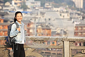 Woman tourist at fenghuang ancient town