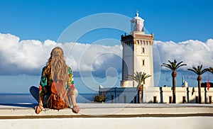 woman tourist looking at cap spartel, tanger