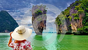 Woman tourist looking at James Bond island in Thailand