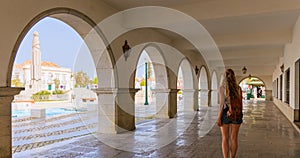 Woman tourist in old market in Tavira in Portugal