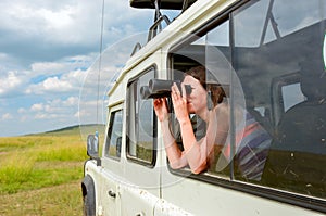 Woman tourist on safari in Africa, travel in Kenya