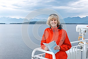 Woman tourist sailing on a sightseeing ferry boat