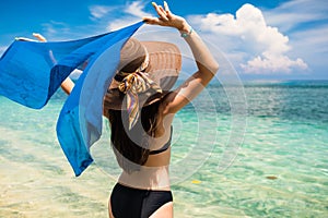 Woman tourist at tropical beach on vacation