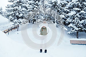 Woman tourist Visiting in Asahikawa, Traveler in Sweater sightseeing Asahiyama Zoo with Snow in winter season. landmark and