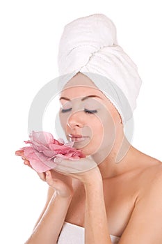 Woman with towel and flower