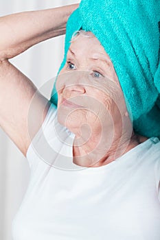 Woman with towel on head