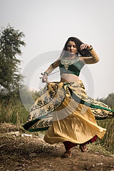 Woman in traditional Indian costume lehenga choli or sari or saree