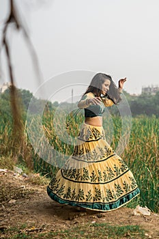 Woman in traditional Indian costume lehenga choli or sari or saree