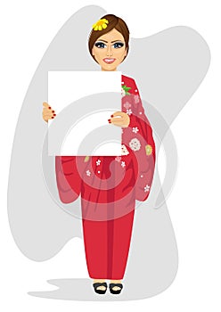 Woman in traditional japanese dress with empty blank board