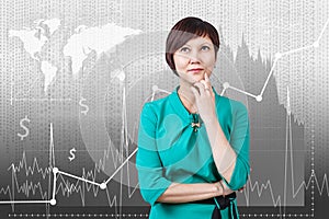 Woman on the traiding graph background