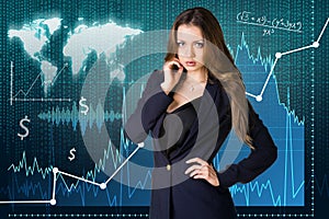 Woman on the traiding graph background