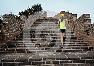 Woman trail runner running on the great wall