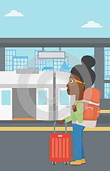 Woman at the train station vector illustration.