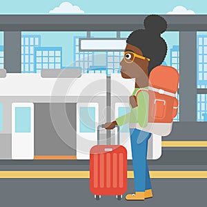 Woman at the train station vector illustration.