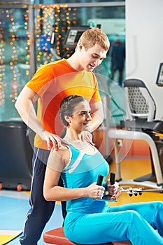 Woman with trainer at training simulator