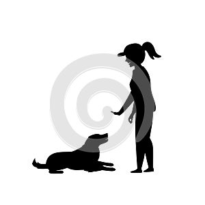 Woman training a dog basic commands