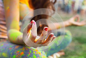 Woman training yoga and meditation at poolside