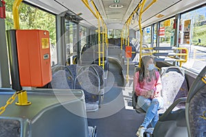 Woman travel in bus at morning