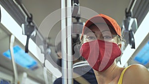 Woman travel caucasian ride at overground train airtrain with wearing protective medical mask. Girl tourist at airtrain