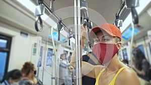 Woman travel caucasian ride at overground train airtrain with wearing protective medical mask. Girl tourist at airtrain