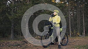 The woman travel on mixed terrain cycle touring with bike bikepacking. The traveler journey with bicycle bags. Magic