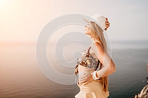 Woman travel sea. Happy tourist enjoy taking picture outdoors for memories. Woman traveler looks at the edge of the