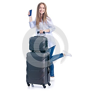 Woman with travel suitcase, passport goes walking smiling happiness