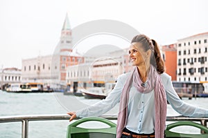 Woman travel by vaporetto in venice, italy