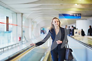 Woman on travelator in the international airport