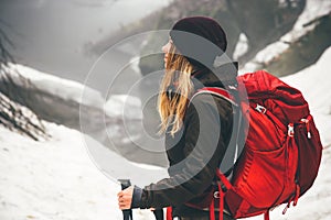 Woman Traveler with backpack hiking