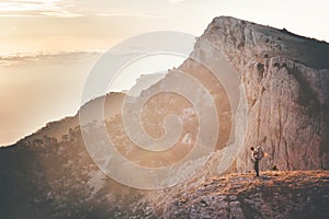 Woman Traveler with backpack hiking