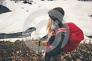 Woman Traveler with backpack hiking